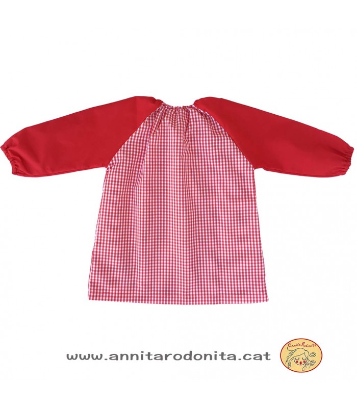 Bata vermella amb goma. Personalitzada amb el nom