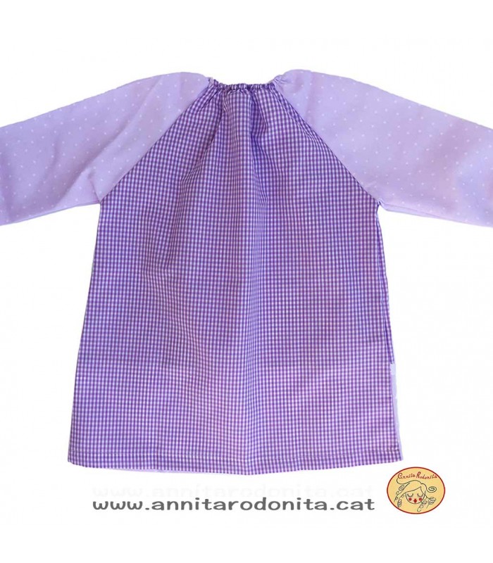 Bata lila estrelletes amb goma. Personalitzada amb el nom