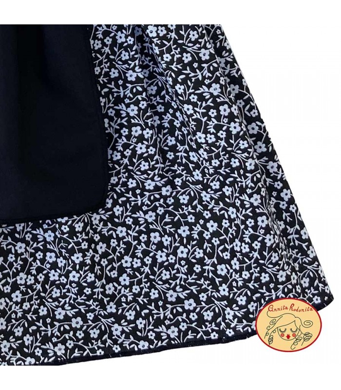 Conjunt castanyera flor blanca i negre