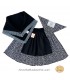 Conjunt castanyera flor blanca i negre